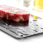 Defrosting tray for thawing frozen foods
