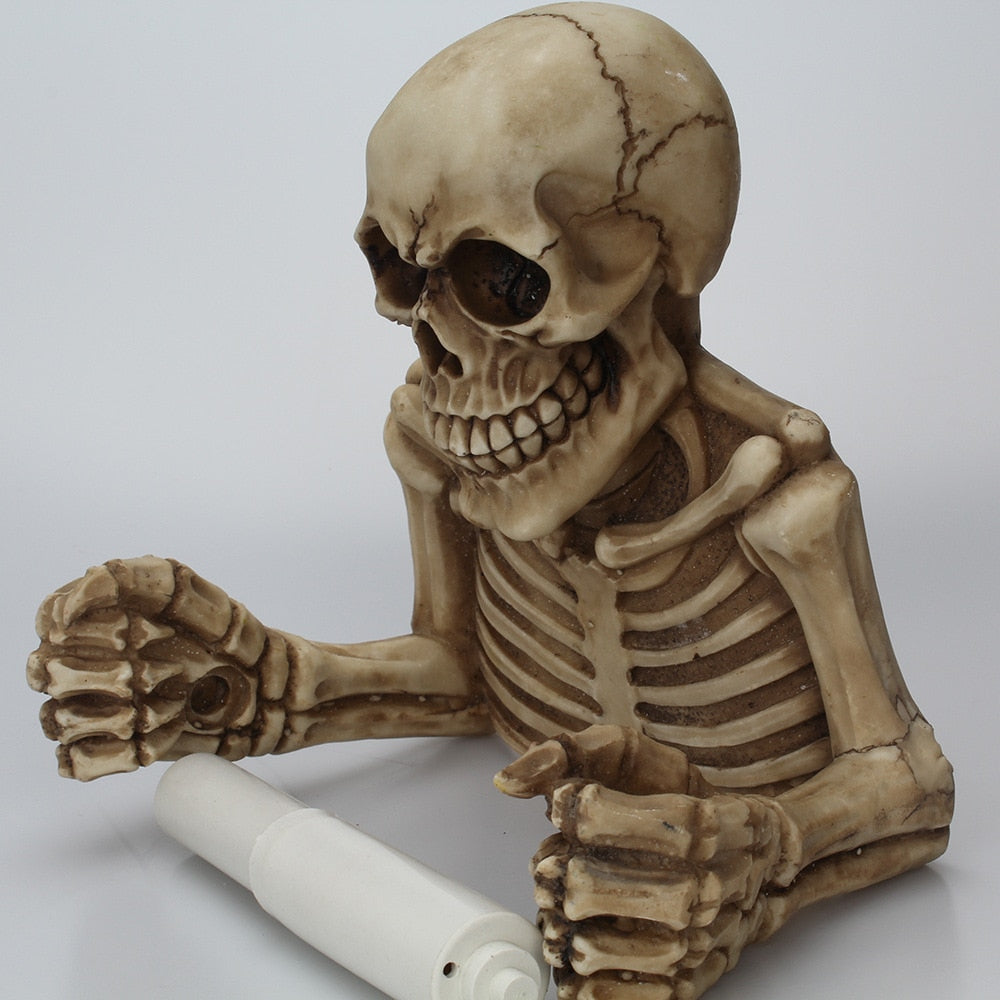 This Creepy Metal Skeleton Toilet Paper Holder Is Perfect For